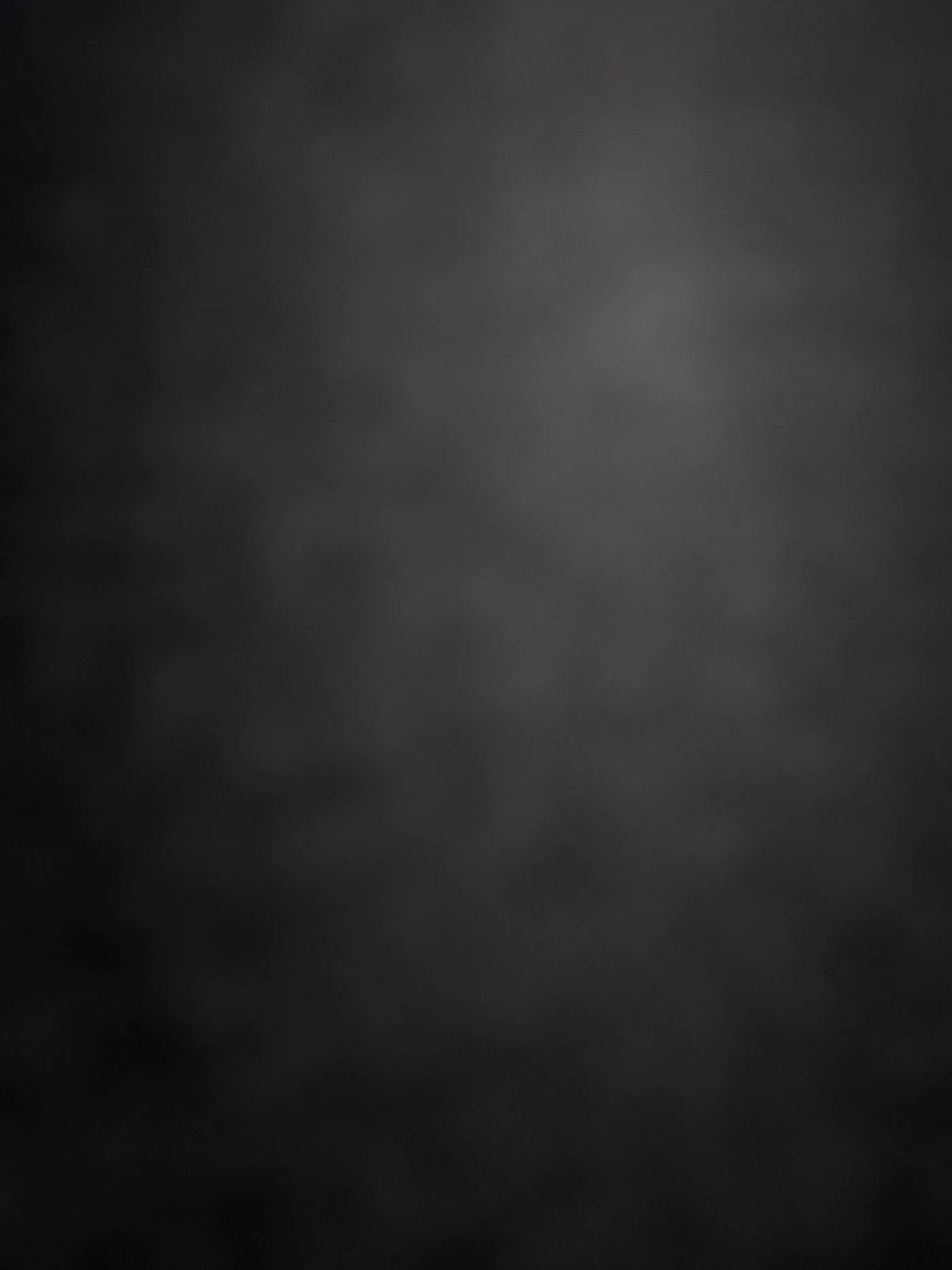 Black cotton ground under harder light from the right.